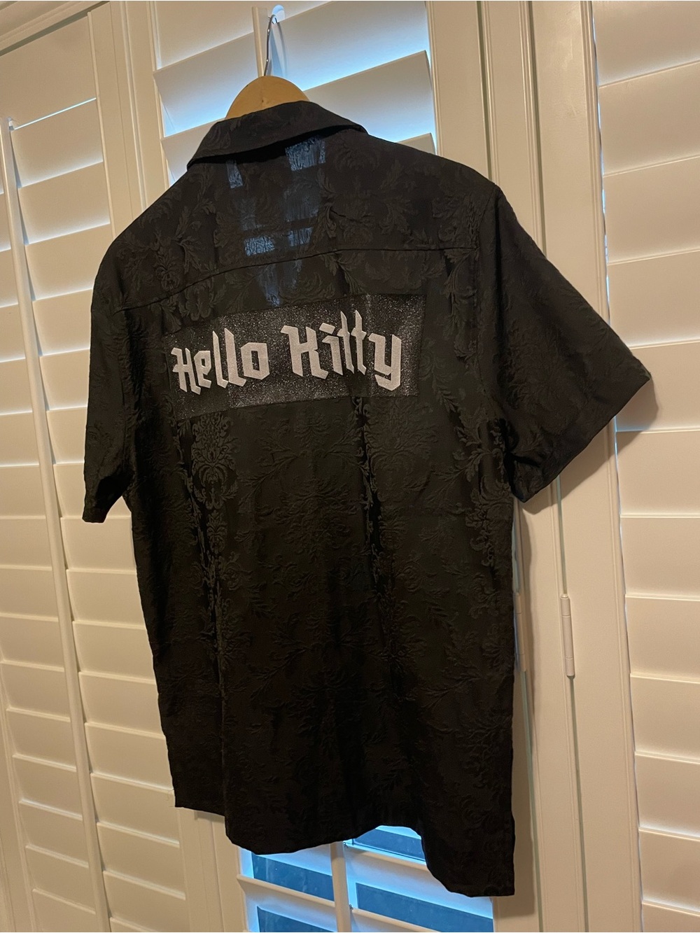 Forever 21 “50th Anniversary” Hello Kitty black button down, size M